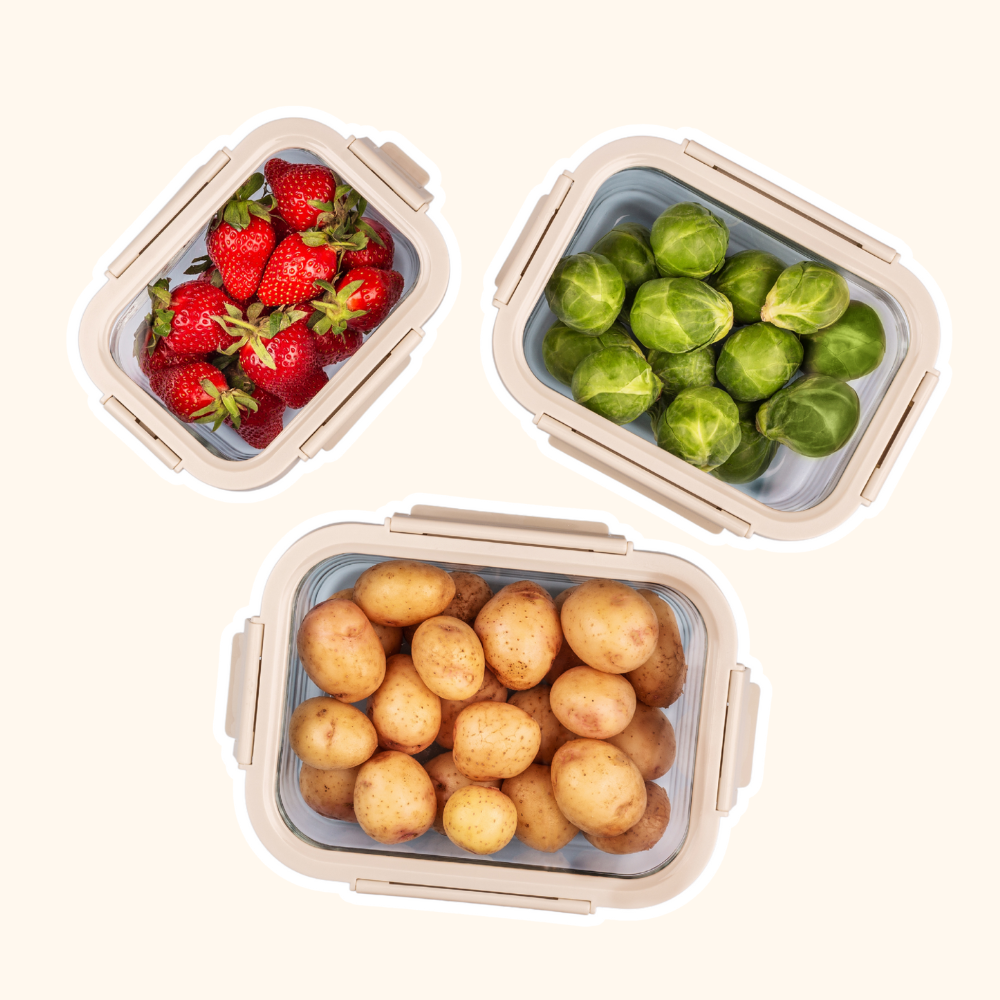 Strawberries, brussels sprouts, and potatoes in eco-friendly leftover containers, meant to show how to reduce plastic use in your home